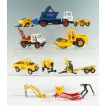 A group of Britains Ltd diecast construction vehicles and accessories, including a skip lorry, a