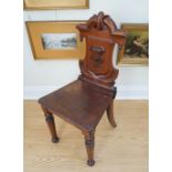 A Victorian mahogany hall chair