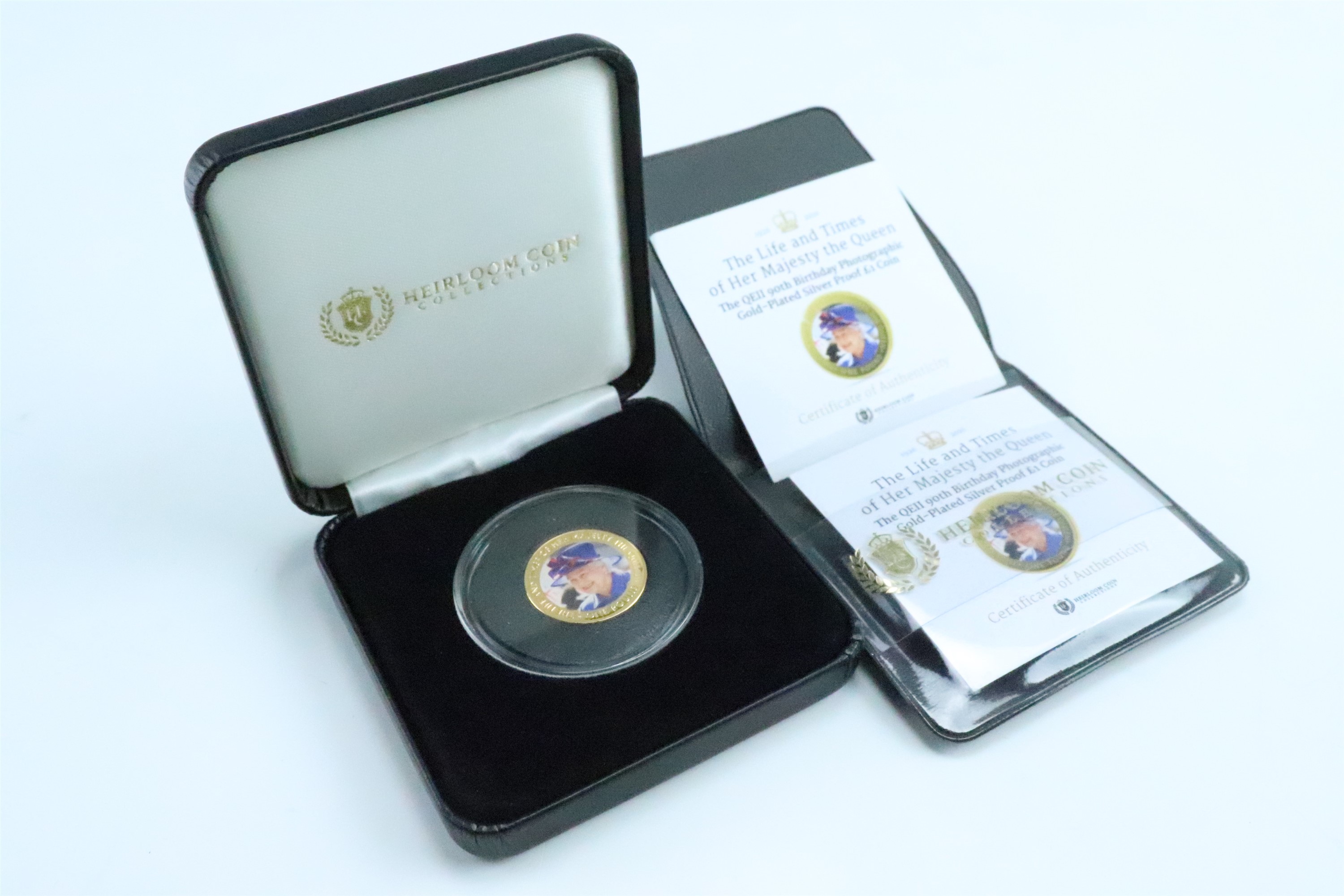 Two Heirloom Coin Collections gold plated silver proof photographic royal commemorative one pound