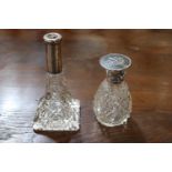 Two silver-mounted dressing table scent bottles, early 20th Century