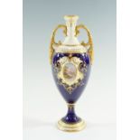 A late 19th / early 20th Century Coalport Loch Tay vase, oviform with slender neck, gilt loop