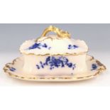 A late 19th / early 20th Century blue, white and gilt sardine dish, impressed "Ivory" mark to the