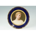 A portrait cabinet plate by Franz Xaver Thallmaier, portraying a downcast woman wearing a pearl
