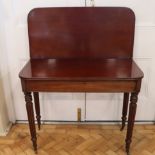 In the manner of Gillows of Lancaster, a Regency mahogany fold over tea table , 92 x 45 x 75 cm