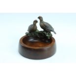 A cold painted bronze and turned mahogany trinket dish bearing grouse, late 20th Century, 9.5 cm