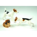Three Royal Doulton dogs, comprising a Scottie, a hound and a King Charles Spaniel, Scottie 10 cm