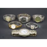 A group of stainless steel wristwatches, including Accurist, Marathon, etc