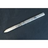An Edwardian silver fruit knife, the slip-fit case decorated with engraved foliate scrolls, Francis