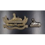 A Gloucestershire Regiment pouch badge, 9.5 cm x 6 cm, together with a cast sphinx badge