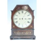A Regency brass inlaid mahogany mantle clock, the two train fussee movement striking on a bell,