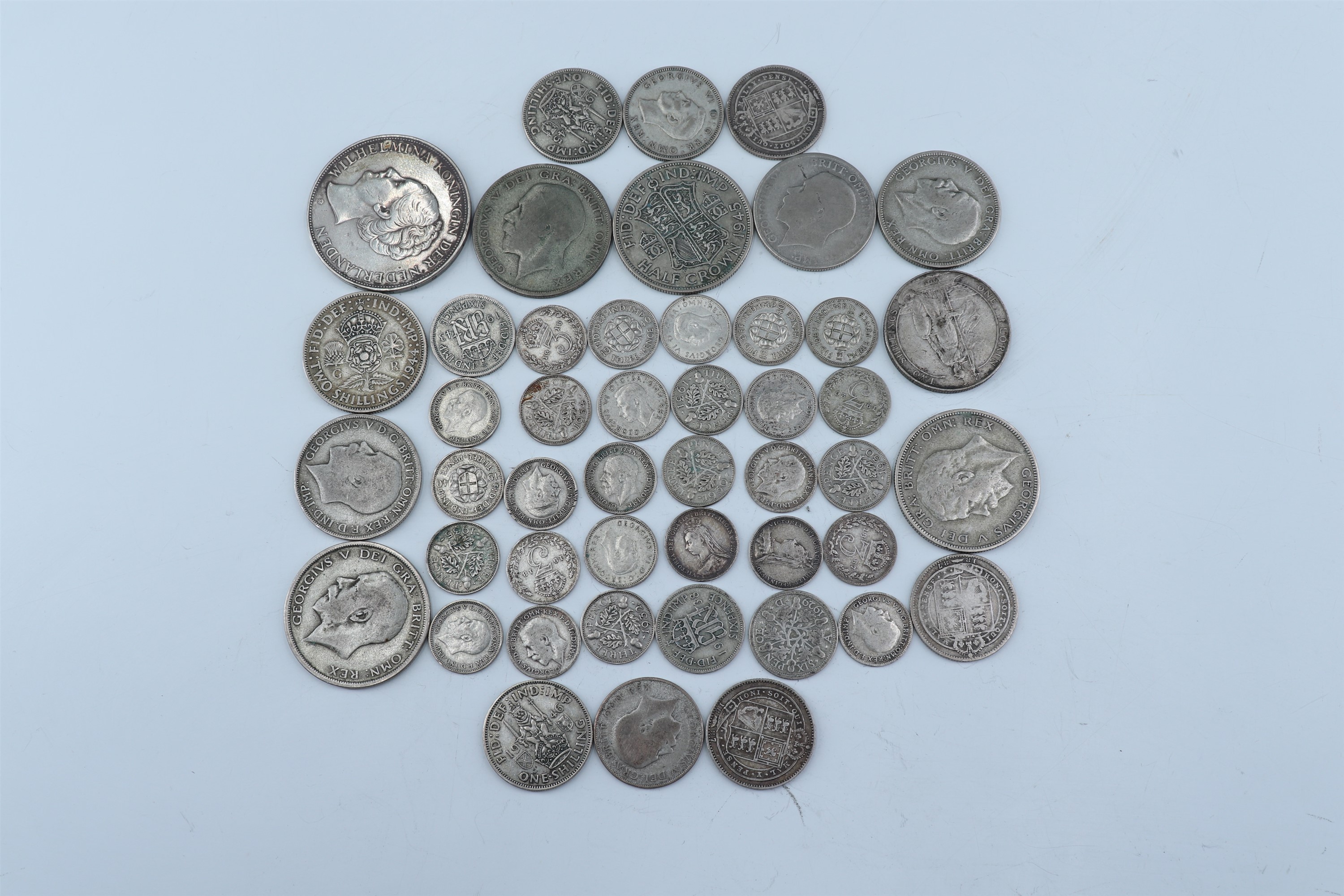 A 1939 Netherlands 2 1/2 Gulden Guilders together with a quantity of Victorian and pre-1947 GB - Image 2 of 3