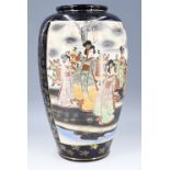 A large early 20th Century Japanese Satsuma vase, decorated in depiction of geisha and a minka,