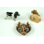 A diminutive Beswick dog together with a Wade cat mask plaque and a Chiltern Collection pig, Beswick