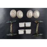 A pair of vintage lens shaped moss agate cuff-links, together with silver and mother-of-pearl, and