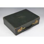 A vintage leather stationary case, having a fitted interior, the lid gilt tooled 'Violet Watt,