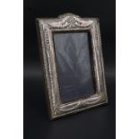 A vintage silver-faced photograph frame, 20 x 14 cm overall, (a/f)