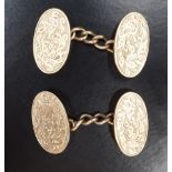 A pair of vintage 9 ct gold floral engraved cuff links, rubbed marks, 4.88 g gross, 17.5 x 11 mm