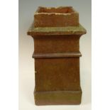 A salt-glazed earthenware chimney pot of tapering square section, 30 x 30.5 x 59 cm