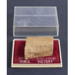 A section of oak from HMS Victory, case 8 cm x 5 cm x 3 cm