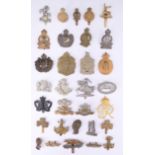 A collection of British army yeomanry cap badges