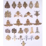 A quantity of British army Corps and other cap badges etc
