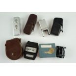 A Minox (Wetzler) leather cased spy camera and a leather cased accessory, together with a Mini Rex