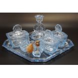 A Daysun of Japan pressed blue glass dressing table set, including a perfume atomizer, circa