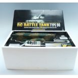 A boxed RC Battle Tank Type 90, radio controlled and having an electric gun system