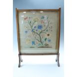 A George V embroidered fire screen, 50 cm x 68 cm overall