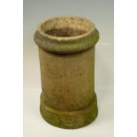 A stoneware chimny pot of cylindrical section, 33 x 50 cm