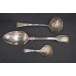A Victorian silver caddy spoon and a thread fiddle pattern table spoon, together with a William IV