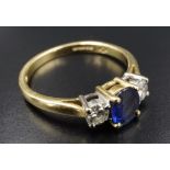 A sapphire and diamond ring, comprising an oval-cut sapphire of approx .75 ct, claw-set between