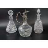 A late 19th / early 20th Century electroplate mounted cut glass claret jug together with two further