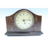 A George V marquetry inlaid mahogany mantle clock, having a key wound drum movement, 15 x 5 x 19 cm