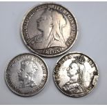 An 1879 Austrian Franz Joseph I Silver Wedding Jubilee non-circulating coin, brooched, together with