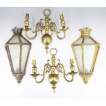 Two pairs of brass wall lights, comprising Dutch style two branch sconces and glazed brass wall