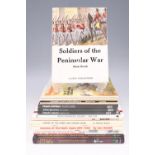 A group of books on military uniforms, etc