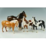A large Beswick shire horse together with a palomino,(ear chip) and two others, tallest 21 cm