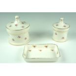Three items of mid 20th Century floral transfer decorated dressing table ceramics, comprising a