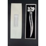 A boxed vintage Swing silver-plated letter opener, the terminal in the form of a bird taking