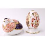 Two Royal Crown Derby paperweights, Quail and Egg On Stand, having white ceramic and gold stoppers