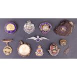 A small group of sweetheart brooches, lapel badges and a military pendant locket