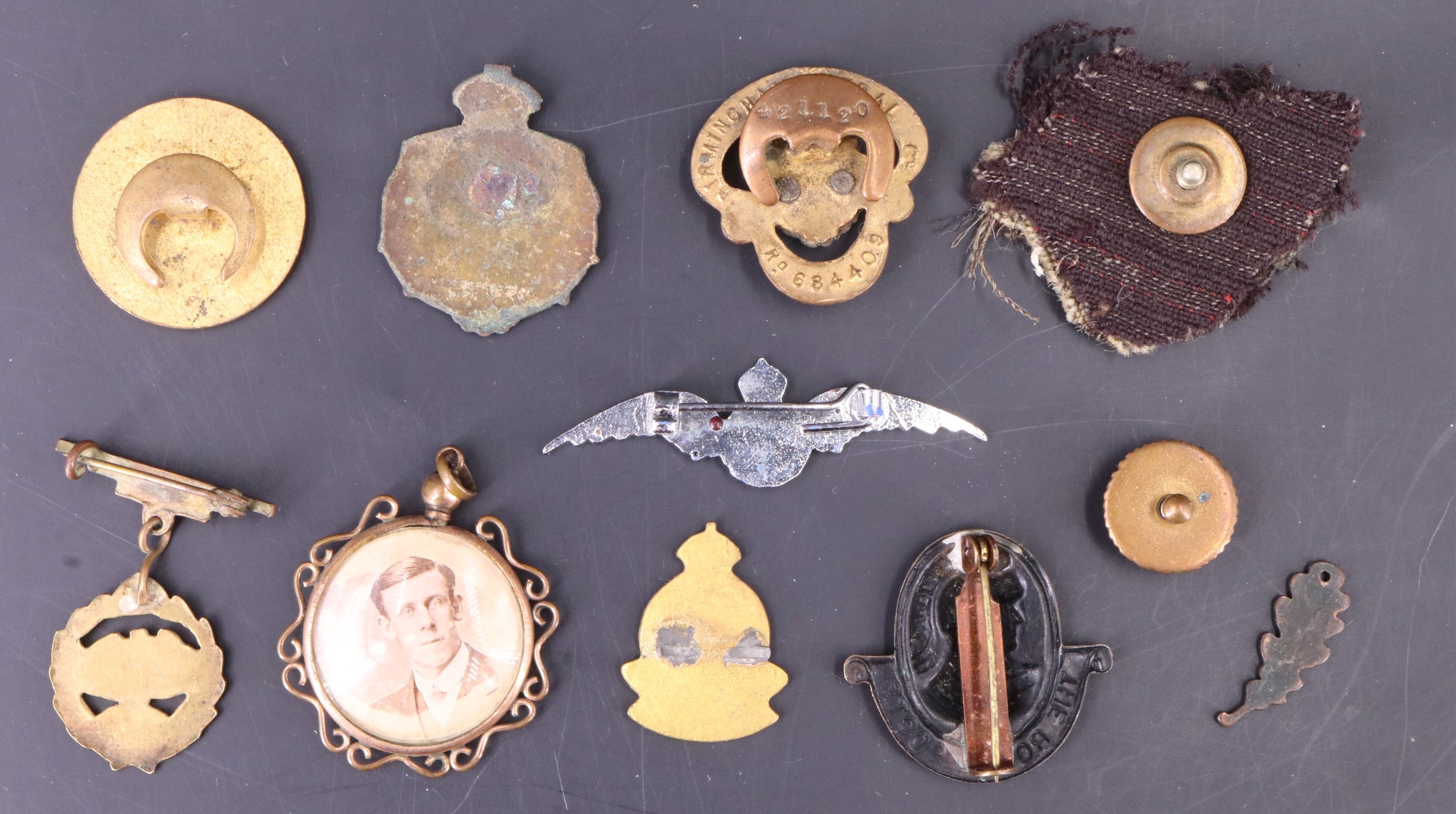 A small group of sweetheart brooches, lapel badges and a military pendant locket - Image 2 of 3