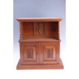 An early 20th Century carved oak smoker's cabinet, 52 x 22 x 55 cm