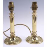 A pair of late 20th Century brass table lamps, (22 cm to top of sockets)