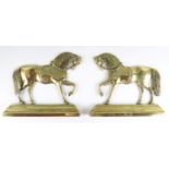 A pair of Victorian brass equestrian fireside ornaments by Greenlees of Glasgow, 29 x 3.5 x 24 cm