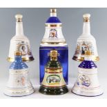 A boxed Wade royal commemorative ceramic decanter of Bell's whisky together with five others