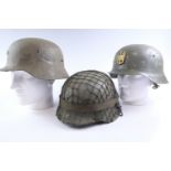 Three Spanish M 1942 helmets