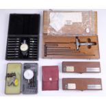 A cased Starrett micrometre depth gauge, two bore gauges, two wobble gauges, and two cased sets of