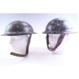 Two Second World War British Home Front Plasfort helmets